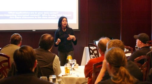 Danelle Au, speaking to the audience gathered at Morton's in Portland, Oregon