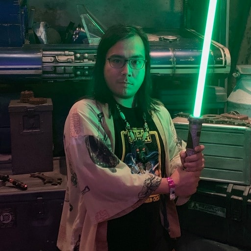 Man with green light saber